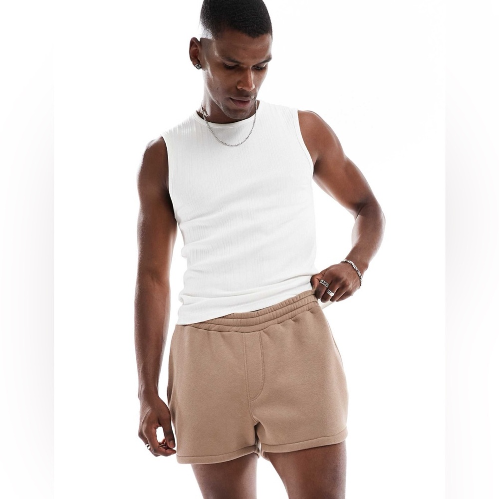 ASOS DESIGN shorter length short with curved hem in brown